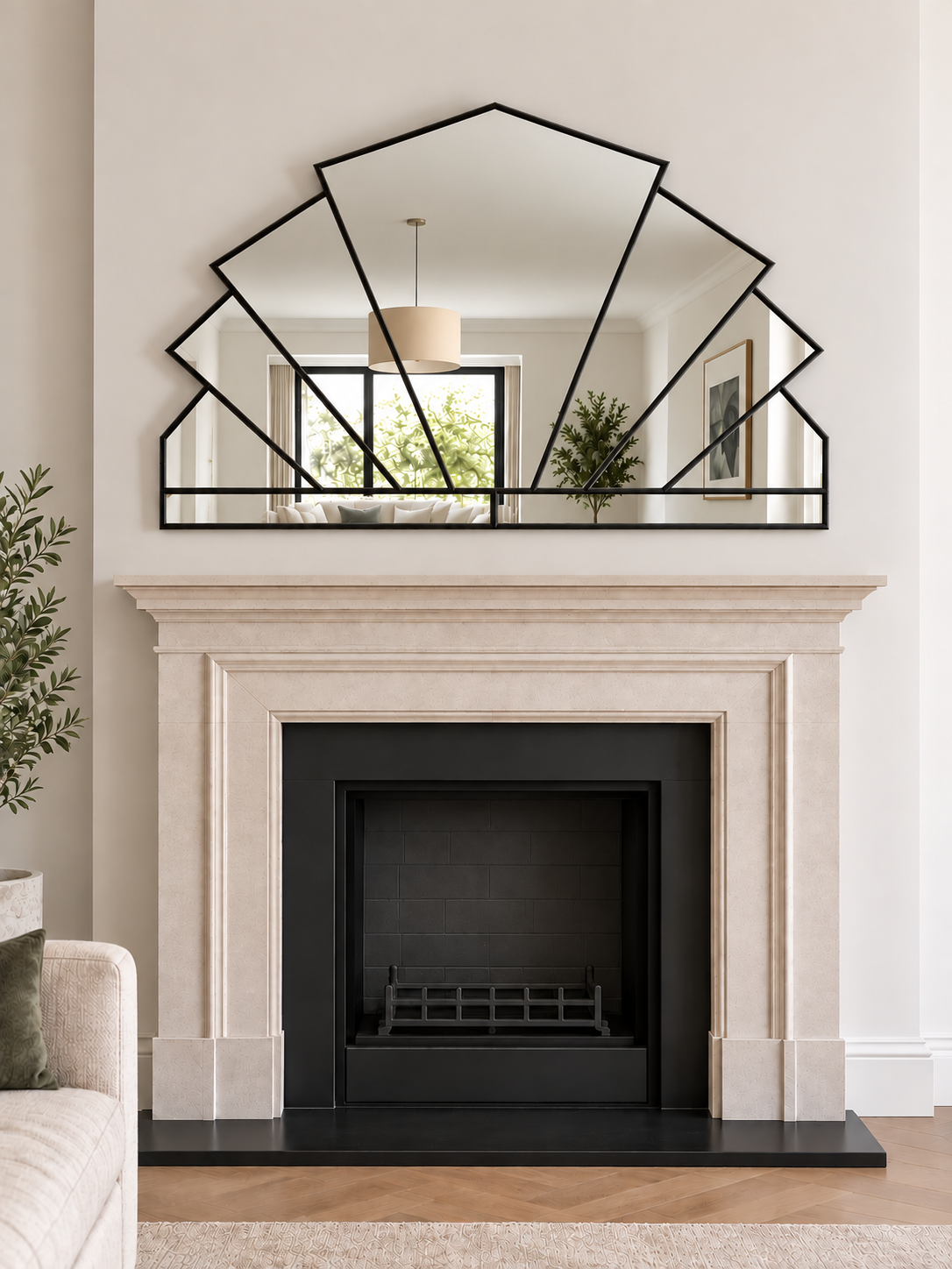 A large geometric overmantle mirror in black