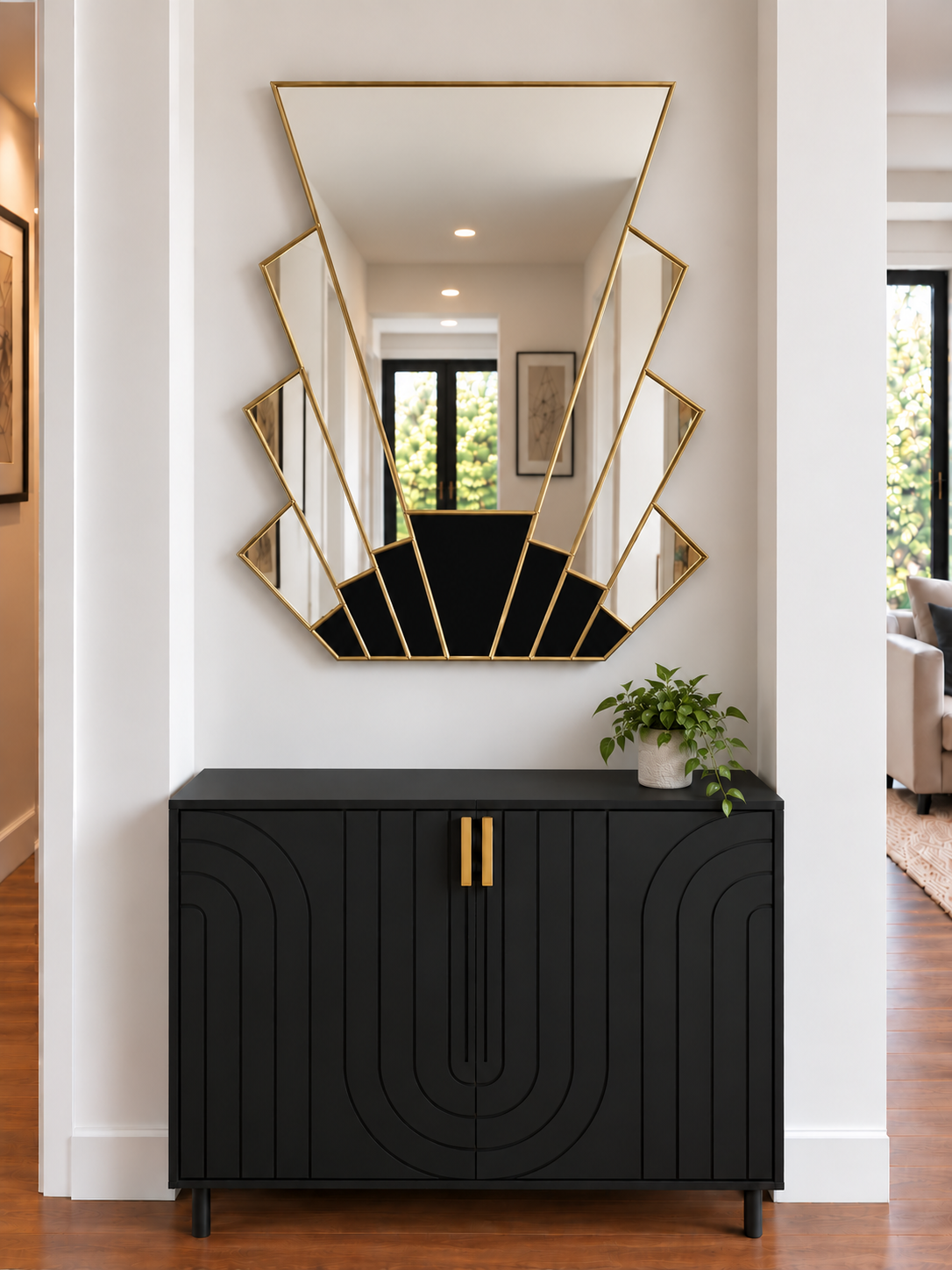 Art deco style wall mirror in brass with black accents 