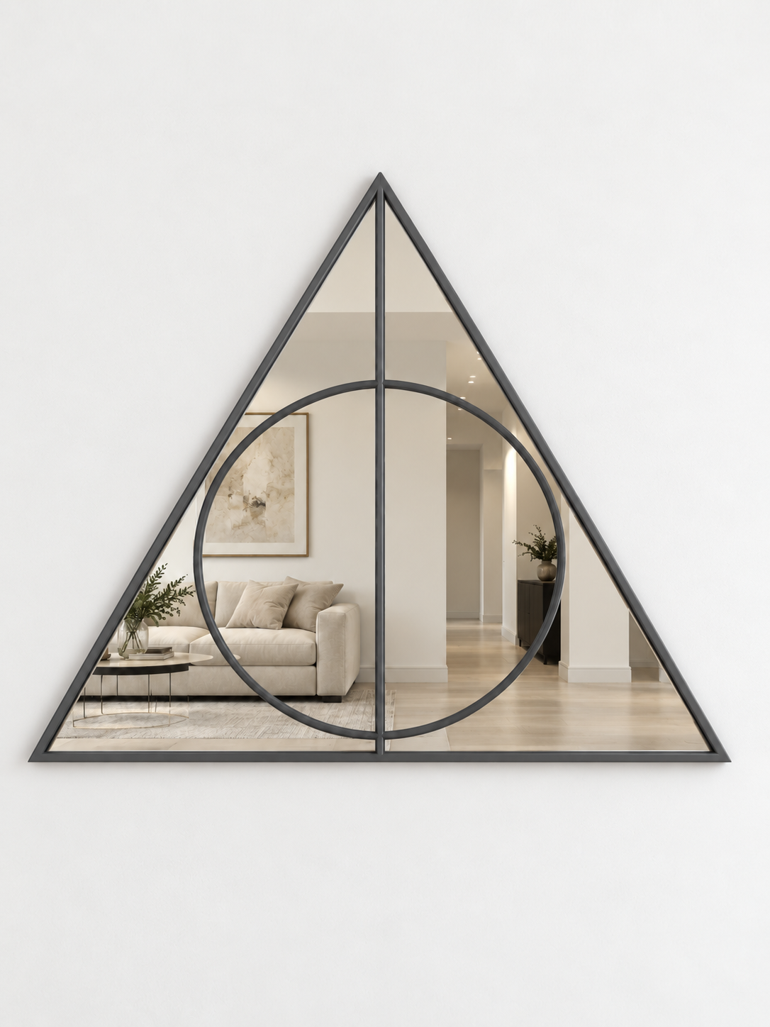 A triangular wall mirror with an antique metal border