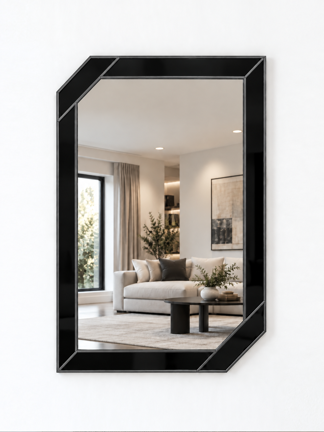 A contemporary wall mirror with black outer panels and an antique metal border