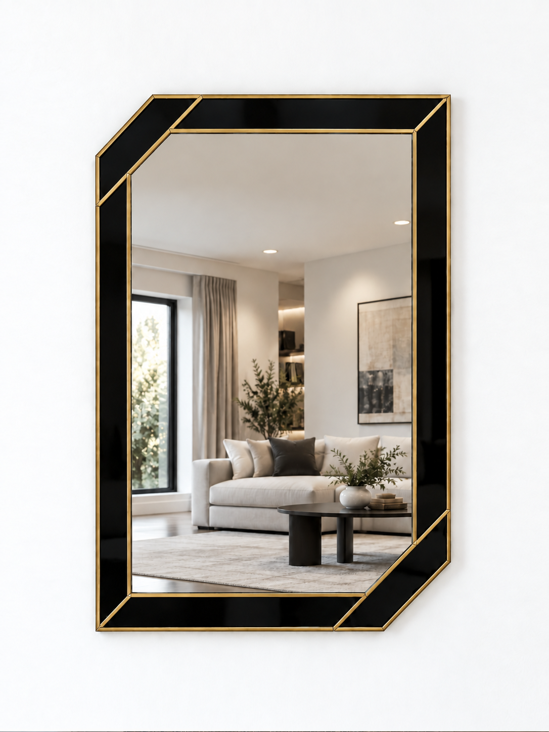 A contemporary wall mirror with black outer panels and a brass metal border