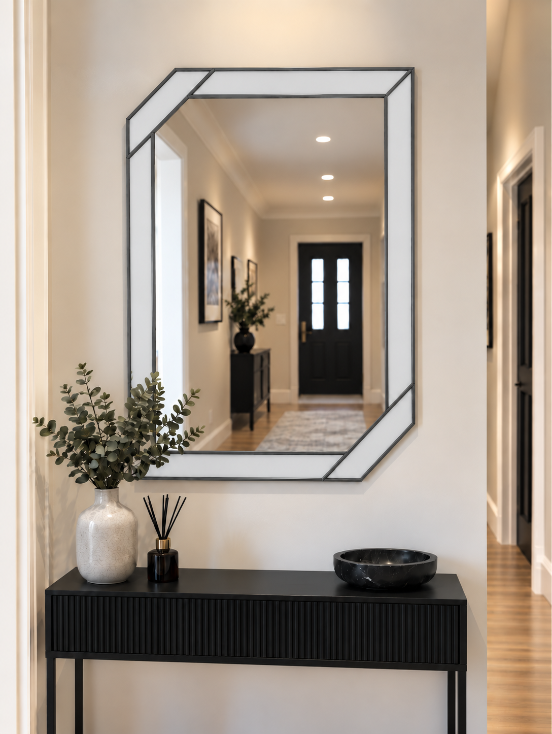 Art deco wall mirror featuring a white border style outer panels in antique