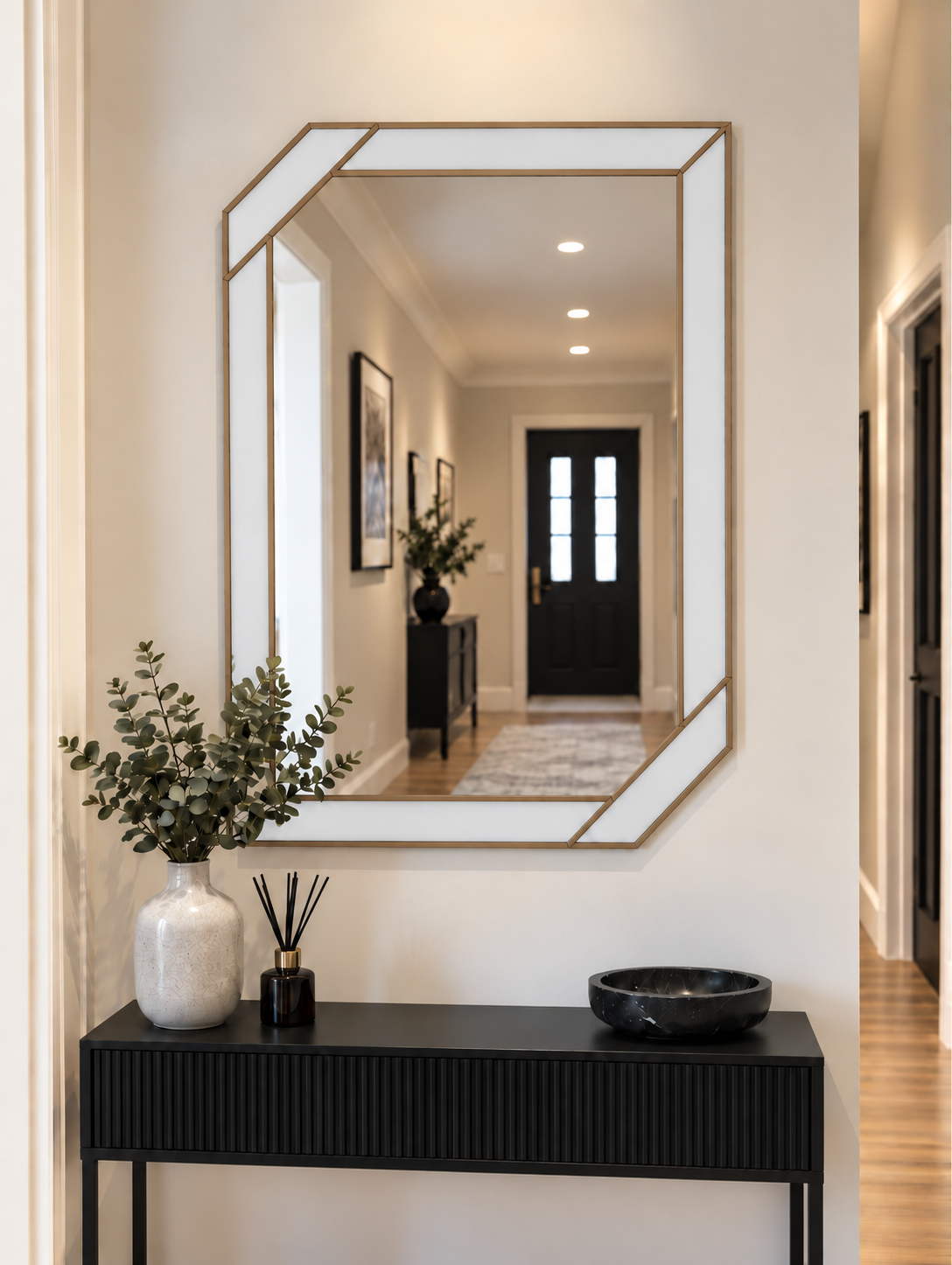 Art deco wall mirror featuring a white border style outer panels in gold