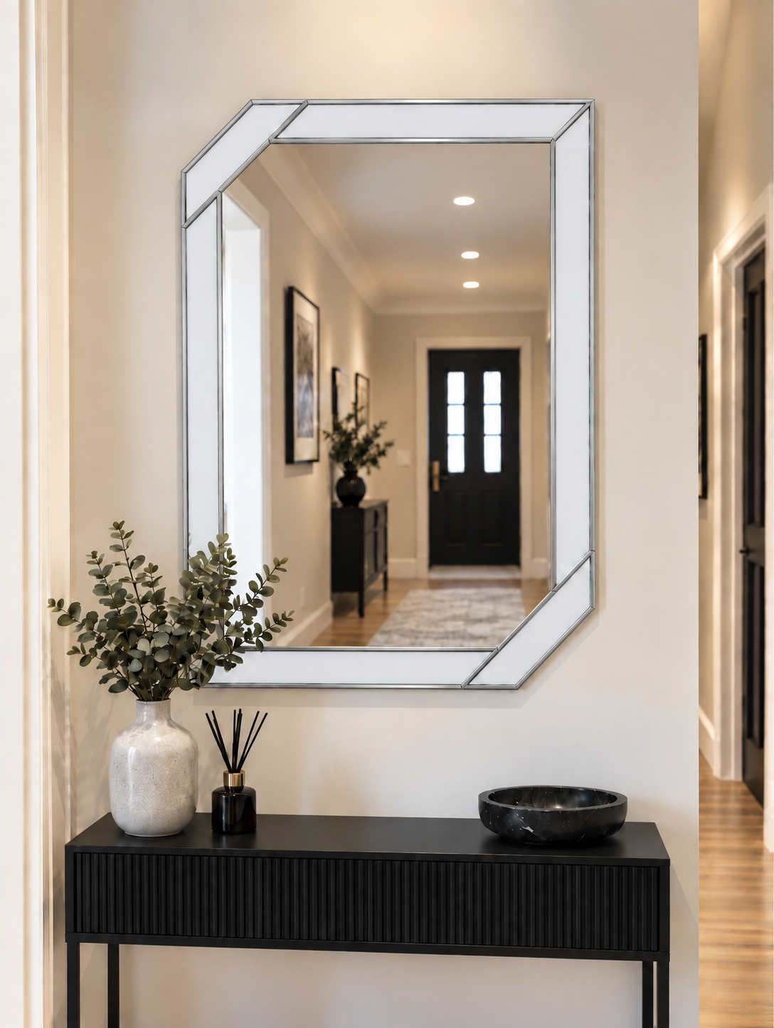 Art deco wall mirror featuring a white border style outer panels in silver